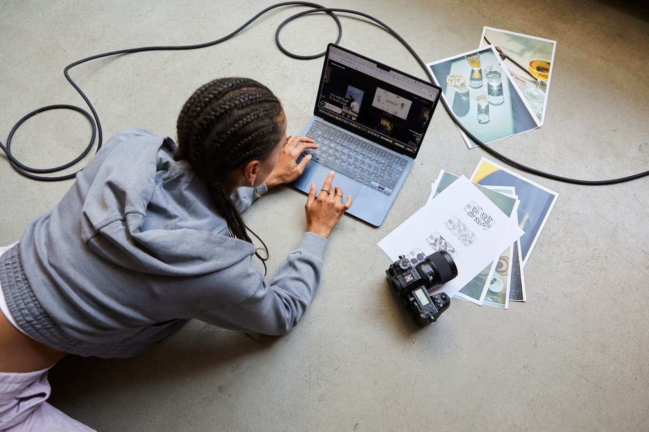 Photographer reviewing designs